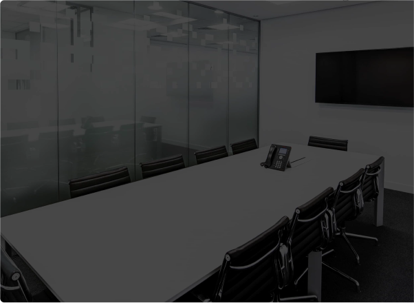 Black and white photo of an empty modern conference room
